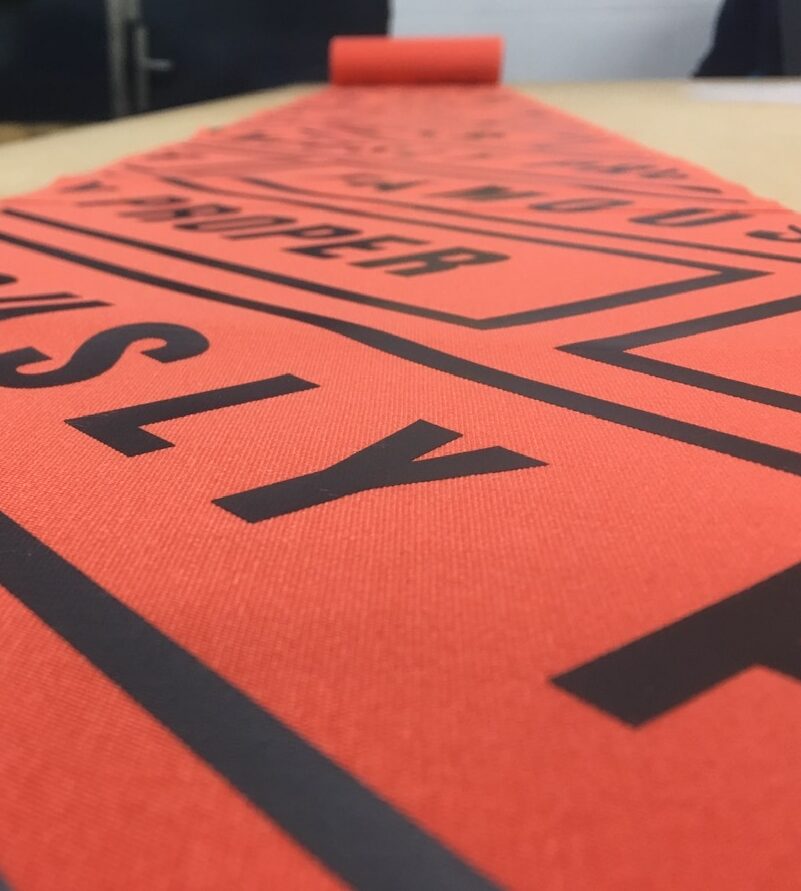 All over branding of 6 metre awning valance for Byron burger restaurant chain. Logo printed in black on to orange acrylic canvas. Printing by Parker Masters Ltd.