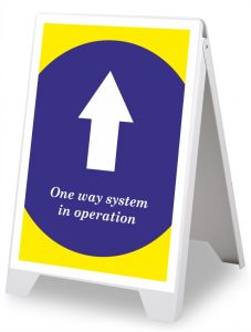 A Board Pavement Signs | Social Distancing One Way System in Operation.